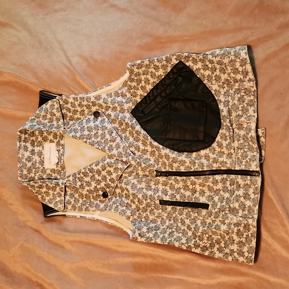 BCBGeneration zip up printed vest with leather accents and pockets